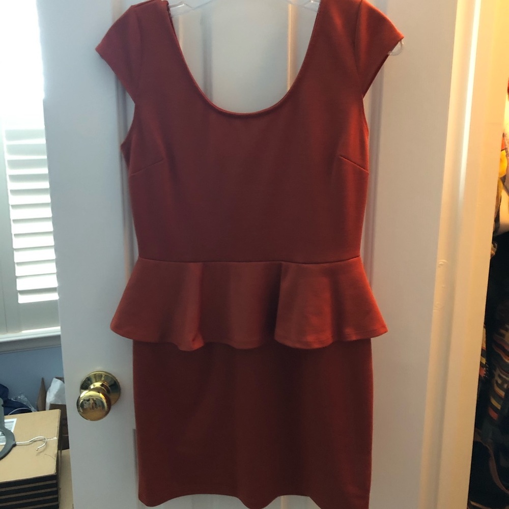 Burnt orange peplum dress